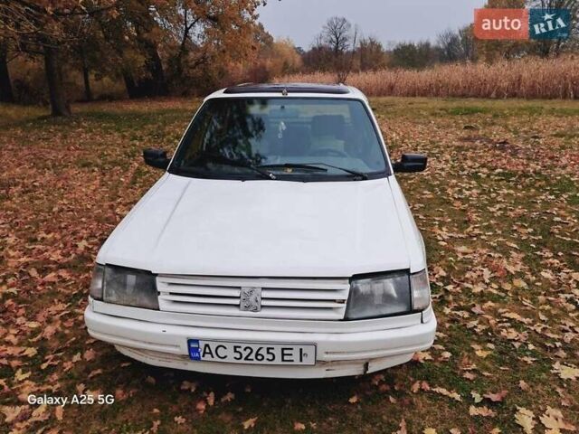 Белый Пежо 309, объемом двигателя 1.3 л и пробегом 300 тыс. км за 800 $, фото 5 на Automoto.ua