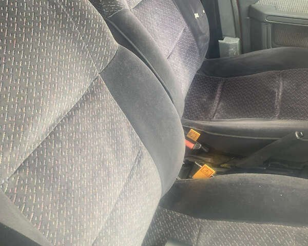 Красный Пежо 309, объемом двигателя 1.6 л и пробегом 100 тыс. км за 950 $, фото 1 на Automoto.ua