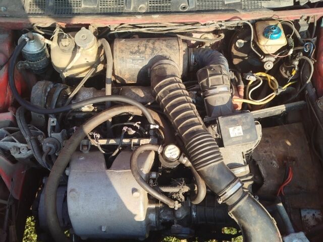 Червоний Пежо 309, об'ємом двигуна 2 л та пробігом 60 тис. км за 650 $, фото 4 на Automoto.ua