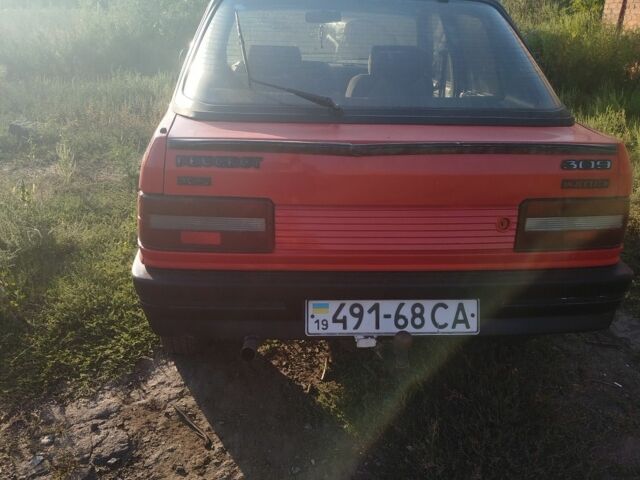Червоний Пежо 309, об'ємом двигуна 2 л та пробігом 60 тис. км за 650 $, фото 2 на Automoto.ua