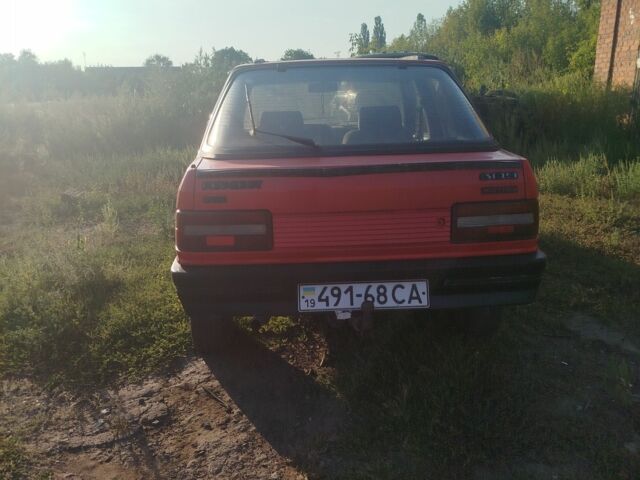 Червоний Пежо 309, об'ємом двигуна 2 л та пробігом 60 тис. км за 650 $, фото 6 на Automoto.ua