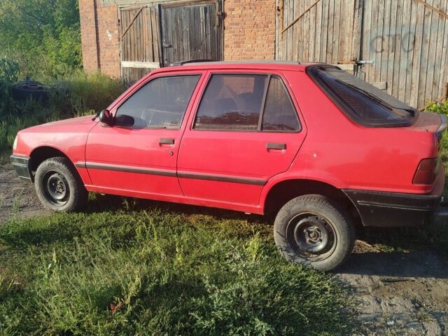 Червоний Пежо 309, об'ємом двигуна 2 л та пробігом 60 тис. км за 650 $, фото 3 на Automoto.ua