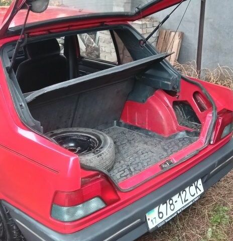 Пежо 309 1992 в Сумах на Automoto.ua Красный Пежо 309, объемом двигателя 1 л и пробегом 230 тыс. км за 797 $, фото 11 на Automoto.ua