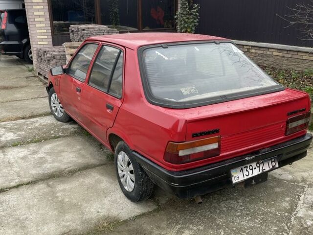 Красный Пежо 309, объемом двигателя 1.4 л и пробегом 250 тыс. км за 600 $, фото 3 на Automoto.ua