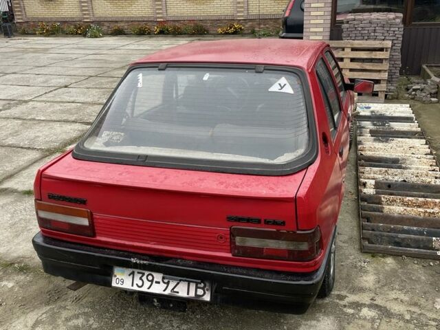 Красный Пежо 309, объемом двигателя 1.4 л и пробегом 250 тыс. км за 600 $, фото 2 на Automoto.ua