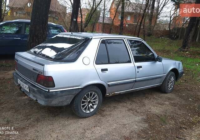 Серый Пежо 309, объемом двигателя 1.4 л и пробегом 222 тыс. км за 1300 $, фото 3 на Automoto.ua