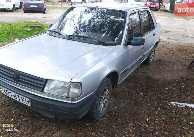 Серый Пежо 309, объемом двигателя 1.4 л и пробегом 222 тыс. км за 1300 $, фото 2 на Automoto.ua