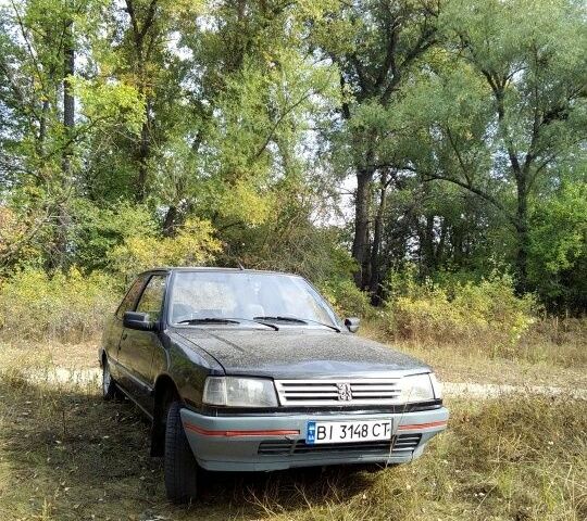 Сірий Пежо 309, об'ємом двигуна 0.13 л та пробігом 170 тис. км за 705 $, фото 1 на Automoto.ua