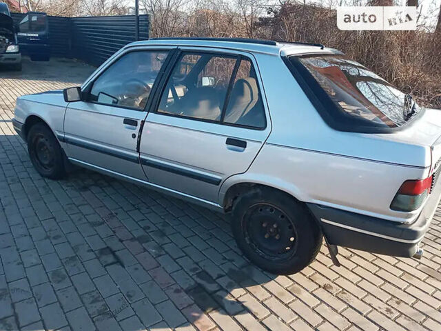 Сірий Пежо 309, об'ємом двигуна 1.9 л та пробігом 177 тис. км за 1350 $, фото 2 на Automoto.ua