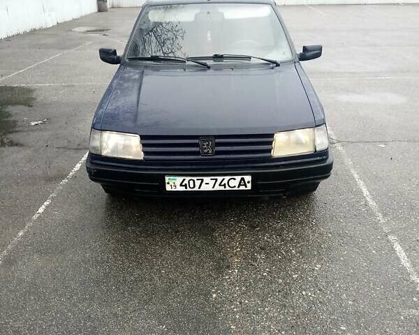 Синій Пежо 309, об'ємом двигуна 1.4 л та пробігом 215 тис. км за 1300 $, фото 4 на Automoto.ua