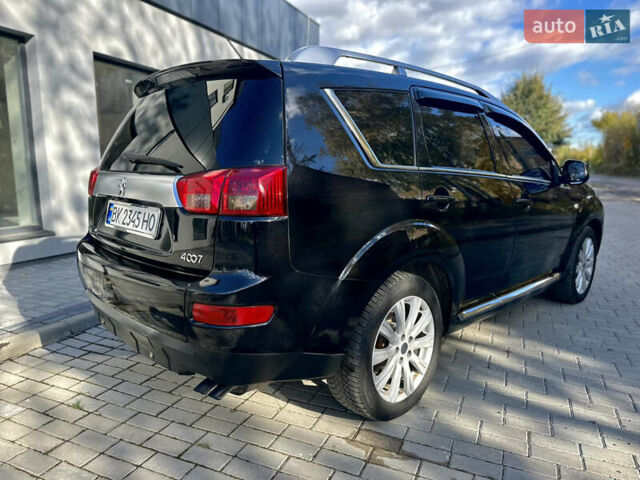 Черный Пежо 4007, объемом двигателя 2.2 л и пробегом 253 тыс. км за 9500 $, фото 5 на Automoto.ua