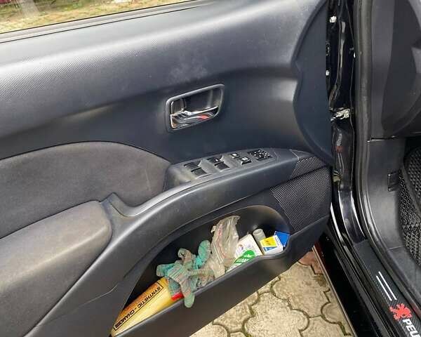 Черный Пежо 4007, объемом двигателя 2.18 л и пробегом 256 тыс. км за 7999 $, фото 12 на Automoto.ua