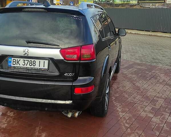 Черный Пежо 4007, объемом двигателя 2.18 л и пробегом 267 тыс. км за 7900 $, фото 7 на Automoto.ua