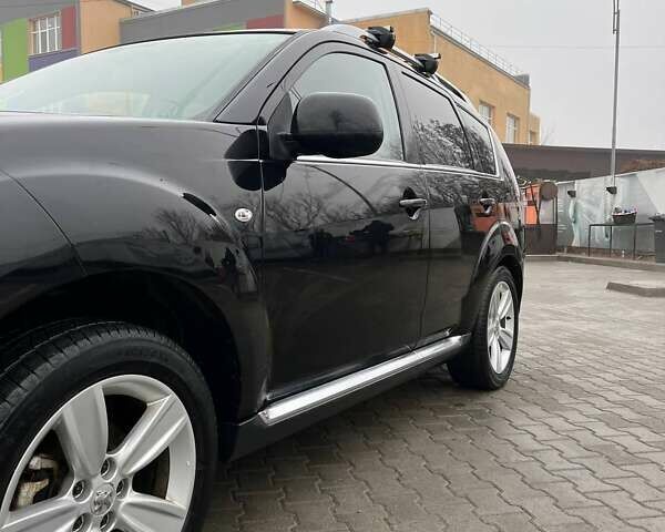 Черный Пежо 4007, объемом двигателя 2.2 л и пробегом 266 тыс. км за 8300 $, фото 28 на Automoto.ua