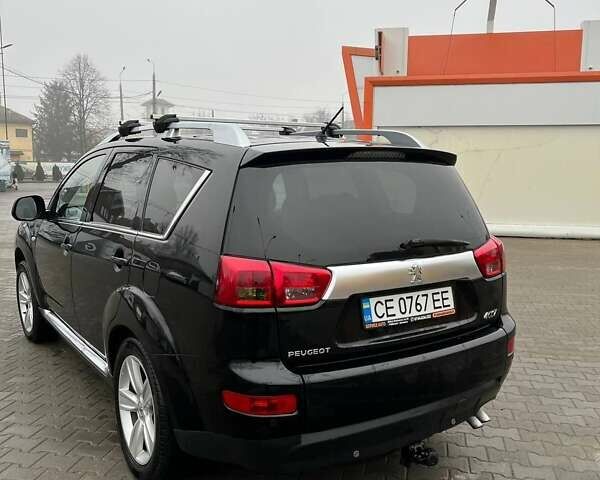 Черный Пежо 4007, объемом двигателя 2.2 л и пробегом 266 тыс. км за 8300 $, фото 10 на Automoto.ua