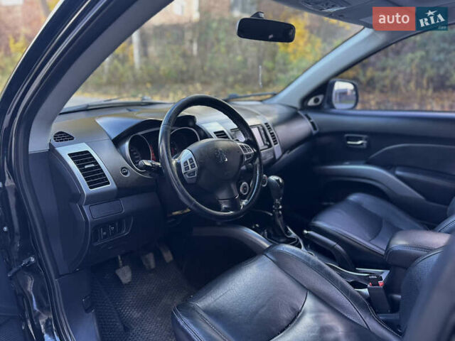 Черный Пежо 4007, объемом двигателя 2.2 л и пробегом 253 тыс. км за 9500 $, фото 11 на Automoto.ua