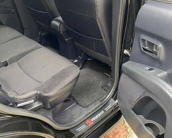 Черный Пежо 4007, объемом двигателя 2.2 л и пробегом 255 тыс. км за 8100 $, фото 13 на Automoto.ua