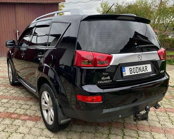 Черный Пежо 4007, объемом двигателя 2.2 л и пробегом 255 тыс. км за 8100 $, фото 3 на Automoto.ua