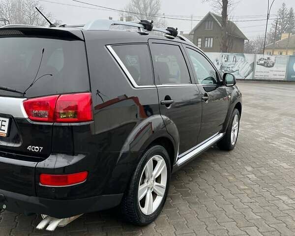 Черный Пежо 4007, объемом двигателя 2.2 л и пробегом 266 тыс. км за 8300 $, фото 11 на Automoto.ua