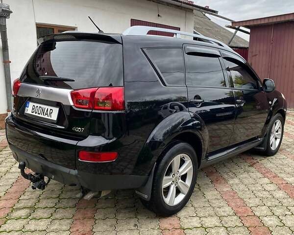 Черный Пежо 4007, объемом двигателя 2.18 л и пробегом 256 тыс. км за 7999 $, фото 3 на Automoto.ua