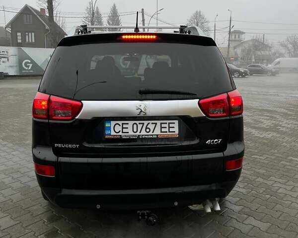 Черный Пежо 4007, объемом двигателя 2.2 л и пробегом 266 тыс. км за 8300 $, фото 3 на Automoto.ua