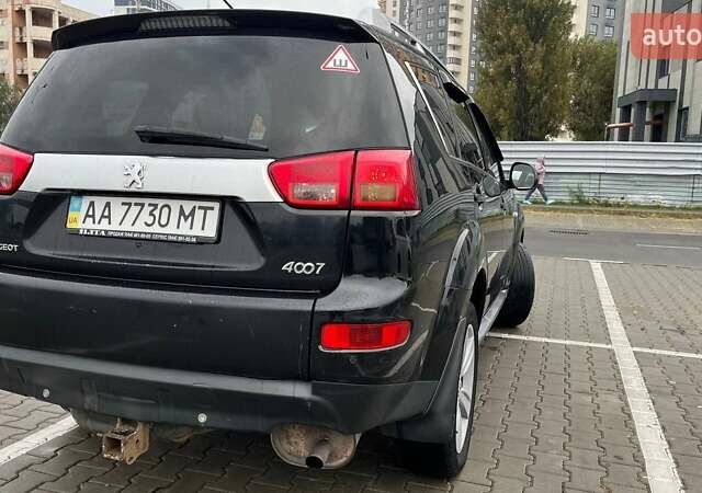 Черный Пежо 4007, объемом двигателя 2.36 л и пробегом 368 тыс. км за 8500 $, фото 5 на Automoto.ua