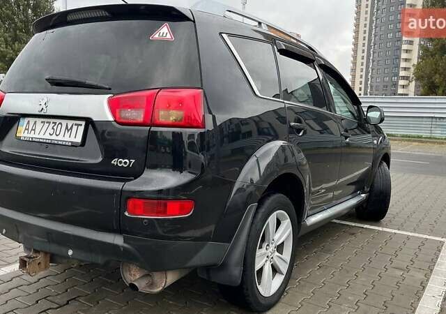 Черный Пежо 4007, объемом двигателя 2.36 л и пробегом 368 тыс. км за 8500 $, фото 4 на Automoto.ua