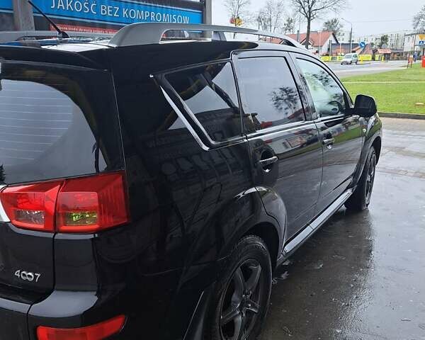 Черный Пежо 4007, объемом двигателя 2.2 л и пробегом 250 тыс. км за 6800 $, фото 5 на Automoto.ua