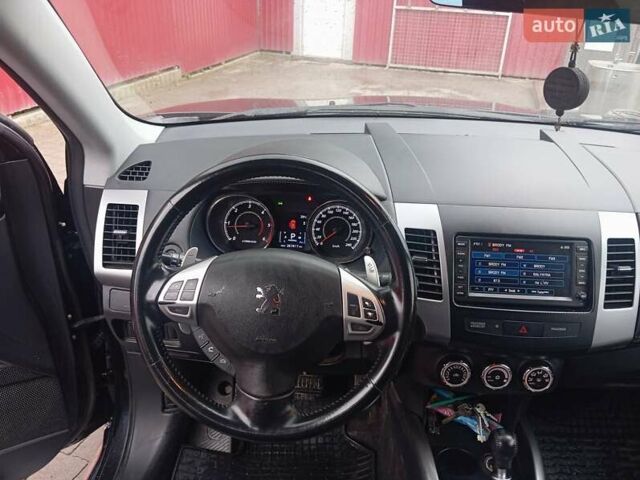Черный Пежо 4007, объемом двигателя 2.2 л и пробегом 268 тыс. км за 9800 $, фото 5 на Automoto.ua