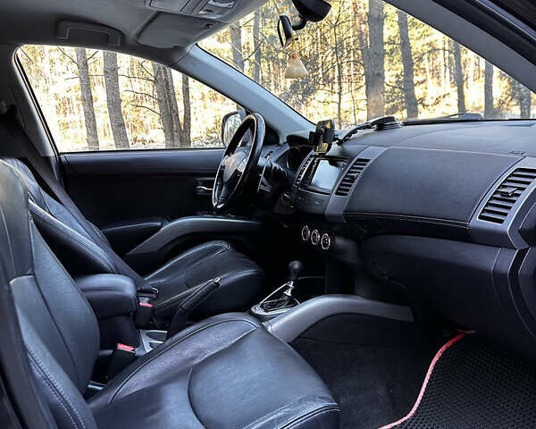 Черный Пежо 4007, объемом двигателя 2.18 л и пробегом 177 тыс. км за 9700 $, фото 6 на Automoto.ua