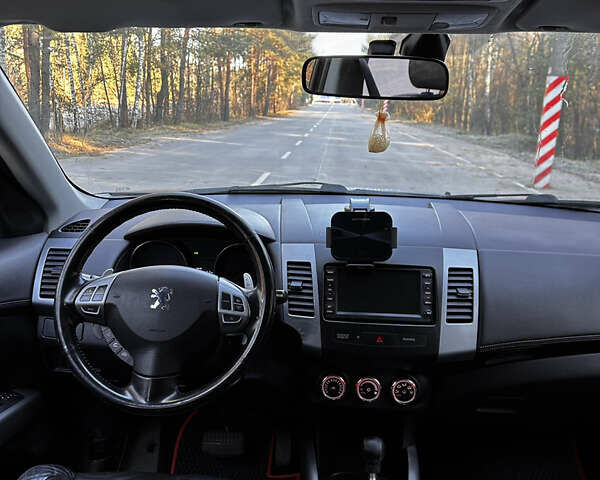 Черный Пежо 4007, объемом двигателя 2.18 л и пробегом 177 тыс. км за 9700 $, фото 3 на Automoto.ua