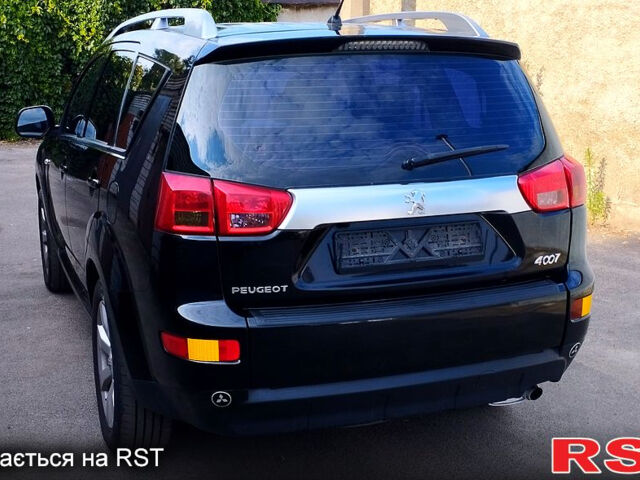 Черный Пежо 4007, объемом двигателя 2.4 л и пробегом 240 тыс. км за 10500 $, фото 2 на Automoto.ua