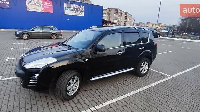 Черный Пежо 4007, объемом двигателя 2.2 л и пробегом 162 тыс. км за 12000 $, фото 2 на Automoto.ua