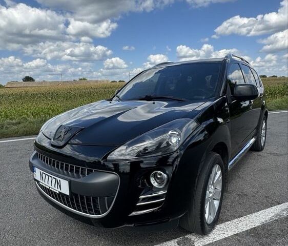 Черный Пежо 4007, объемом двигателя 2.2 л и пробегом 250 тыс. км за 10500 $, фото 1 на Automoto.ua