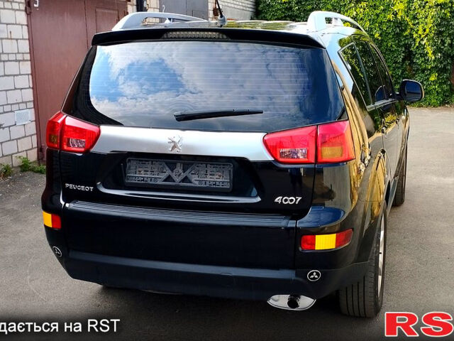 Черный Пежо 4007, объемом двигателя 2.4 л и пробегом 240 тыс. км за 10500 $, фото 4 на Automoto.ua