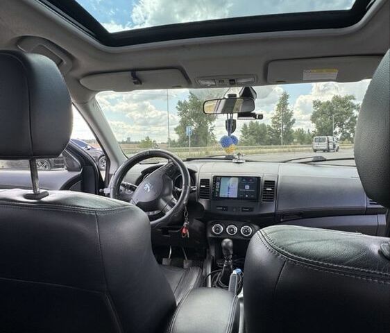 Черный Пежо 4007, объемом двигателя 2.2 л и пробегом 250 тыс. км за 10500 $, фото 6 на Automoto.ua