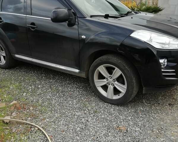 Черный Пежо 4007, объемом двигателя 2.2 л и пробегом 212 тыс. км за 10500 $, фото 11 на Automoto.ua