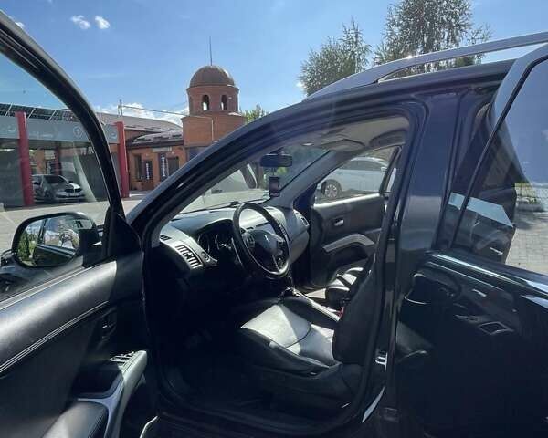 Черный Пежо 4007, объемом двигателя 2.18 л и пробегом 255 тыс. км за 9500 $, фото 9 на Automoto.ua