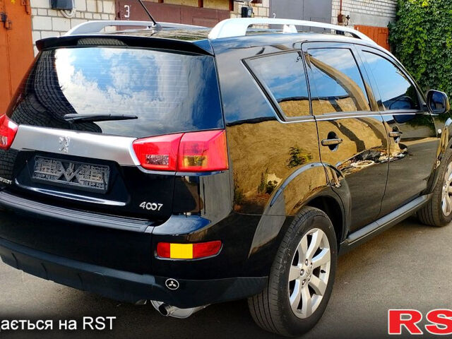 Черный Пежо 4007, объемом двигателя 2.4 л и пробегом 240 тыс. км за 10500 $, фото 5 на Automoto.ua