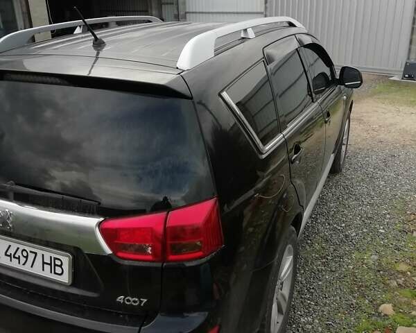 Черный Пежо 4007, объемом двигателя 2.2 л и пробегом 212 тыс. км за 10500 $, фото 7 на Automoto.ua