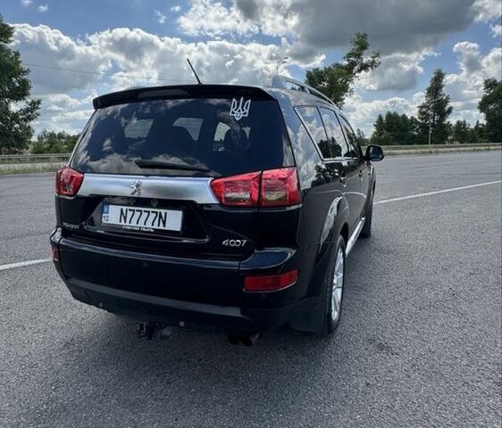 Черный Пежо 4007, объемом двигателя 2.2 л и пробегом 250 тыс. км за 10500 $, фото 3 на Automoto.ua