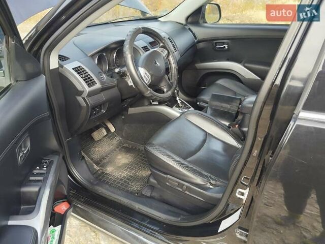 Черный Пежо 4007, объемом двигателя 2.18 л и пробегом 270 тыс. км за 10300 $, фото 2 на Automoto.ua