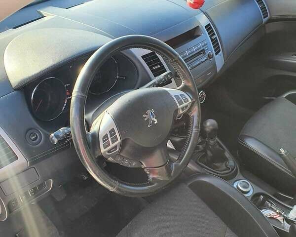 Черный Пежо 4007, объемом двигателя 2.2 л и пробегом 180 тыс. км за 11000 $, фото 6 на Automoto.ua