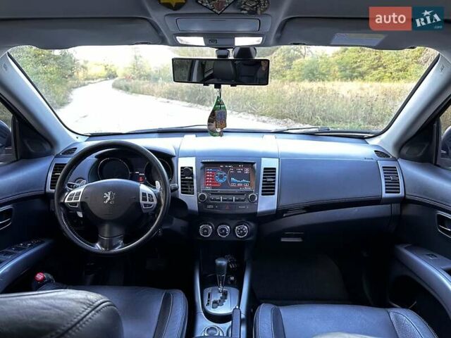 Пежо 4007 2011 в Харькове на Automoto.ua Черный Пежо 4007, объемом двигателя 2.36 л и пробегом 116 тыс. км за 12299 $, фото 4 на Automoto.ua