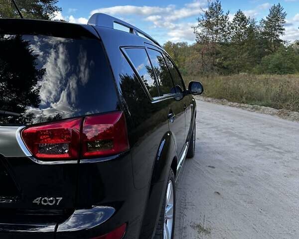 Пежо 4007 2011 в Харькове на Automoto.ua Черный Пежо 4007, объемом двигателя 2.36 л и пробегом 116 тыс. км за 12299 $, фото 2 на Automoto.ua