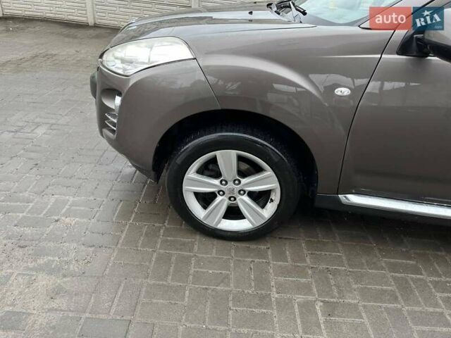 Коричневый Пежо 4007, объемом двигателя 2.18 л и пробегом 230 тыс. км за 9050 $, фото 1 на Automoto.ua