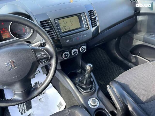 Пежо 4007, объемом двигателя 2.2 л и пробегом 147 тыс. км за 9790 $, фото 19 на Automoto.ua