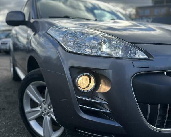 Серый Пежо 4007, объемом двигателя 2.36 л и пробегом 167 тыс. км за 9500 $, фото 1 на Automoto.ua