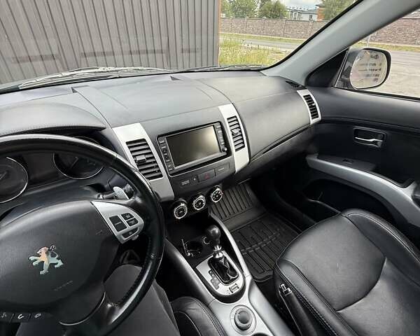 Синий Пежо 4007, объемом двигателя 2.18 л и пробегом 249 тыс. км за 9800 $, фото 6 на Automoto.ua