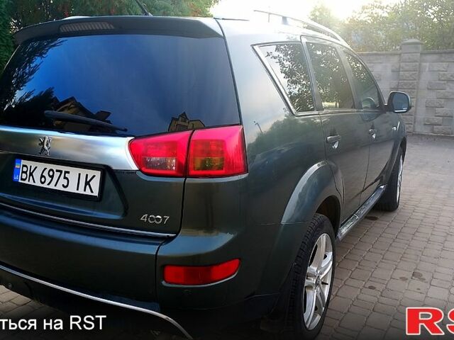 Зеленый Пежо 4007, объемом двигателя 2.2 л и пробегом 223 тыс. км за 8300 $, фото 2 на Automoto.ua